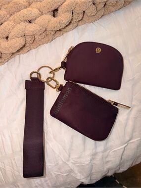 lululemon athletica Coin Pouches & Wrist Strap in Plum